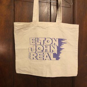 Realisation Par Elton John Tote